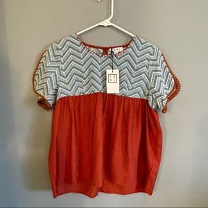 Brand new; never worn! Light canvas embroidered blouse with details on sleeves